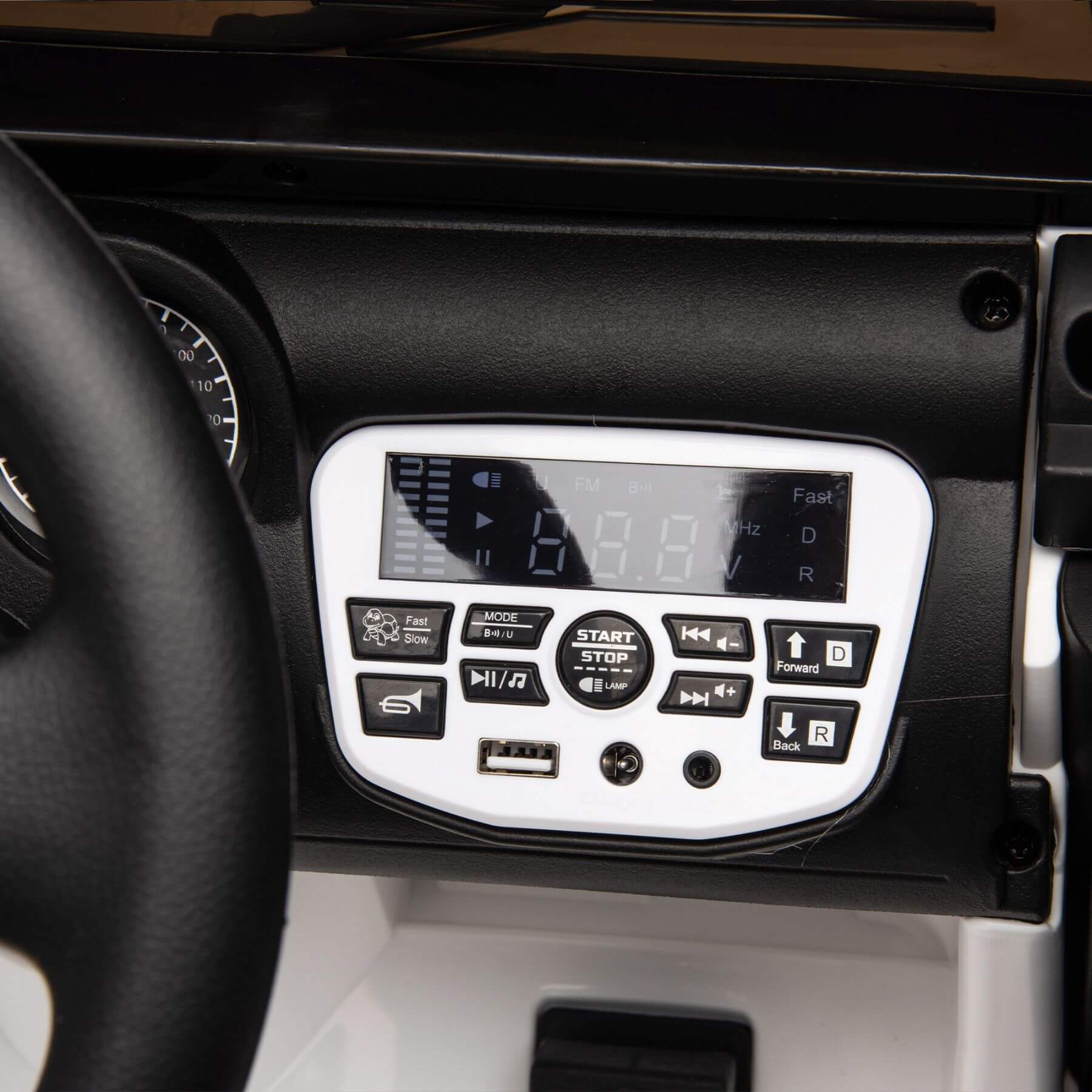 Car dashboard with a control panel featuring buttons and a display.