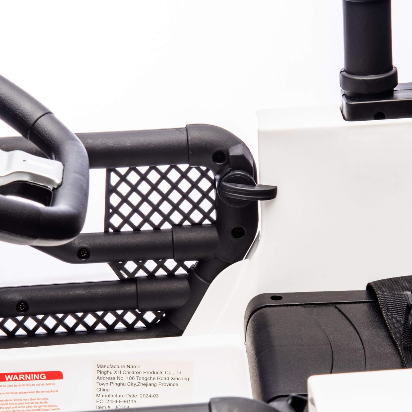 Close-up of a black metal frame with a white background