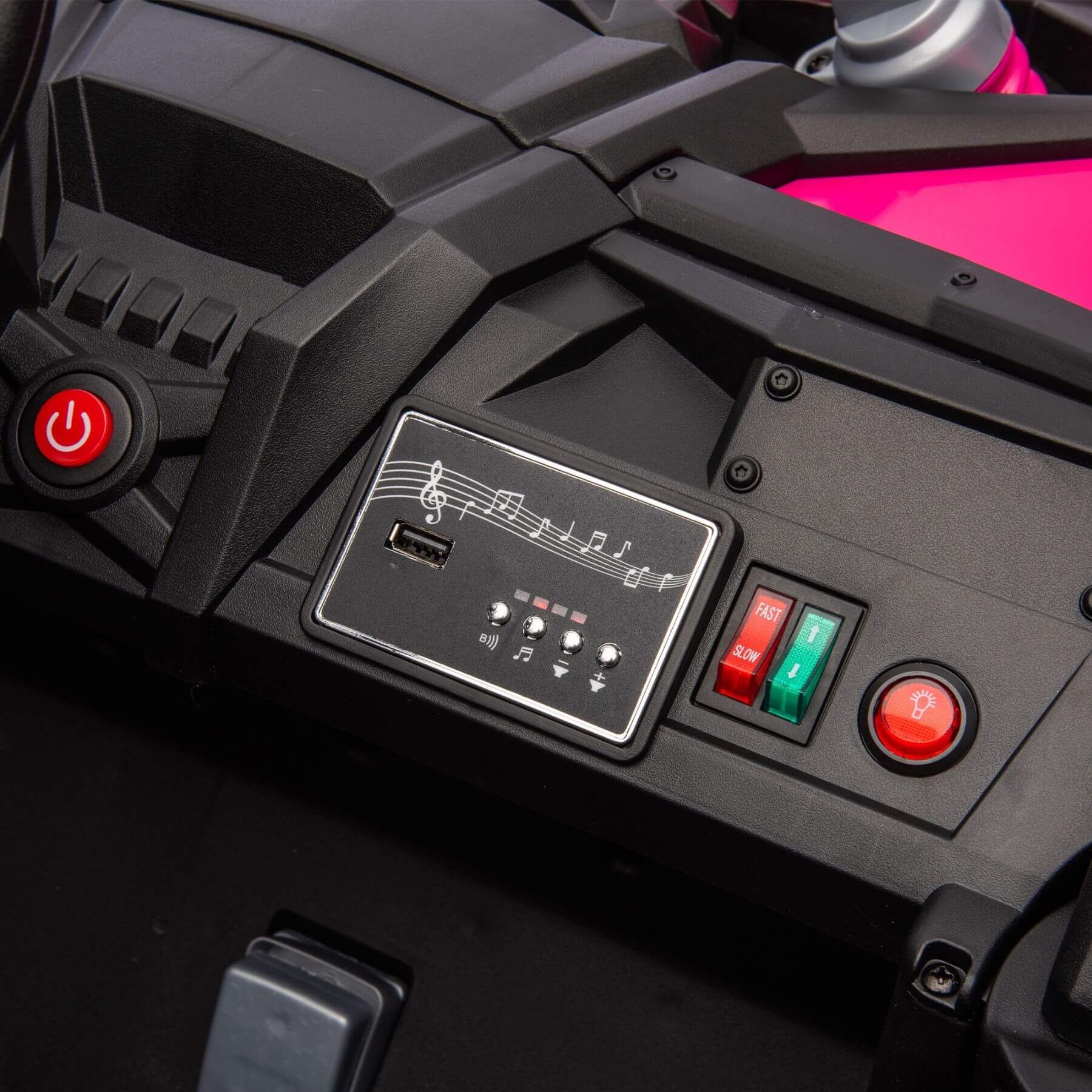 Control panel with buttons and power indicator on a vehicle, likely an ATV or similar off-road vehicle.