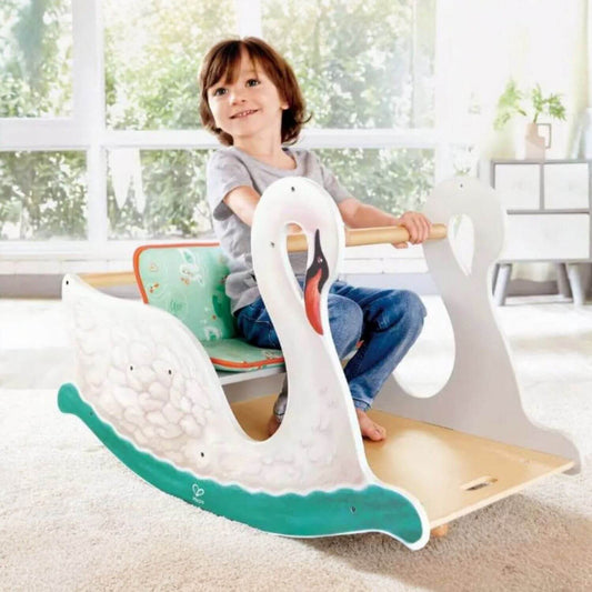 Boy Sitting on Hape 2-in-1 Swan Seat