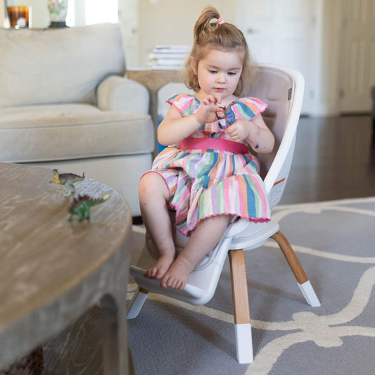 Girl Sitting on TruBliss 2-in-1 Turn-A-Tot Highchair with 360° Swivel