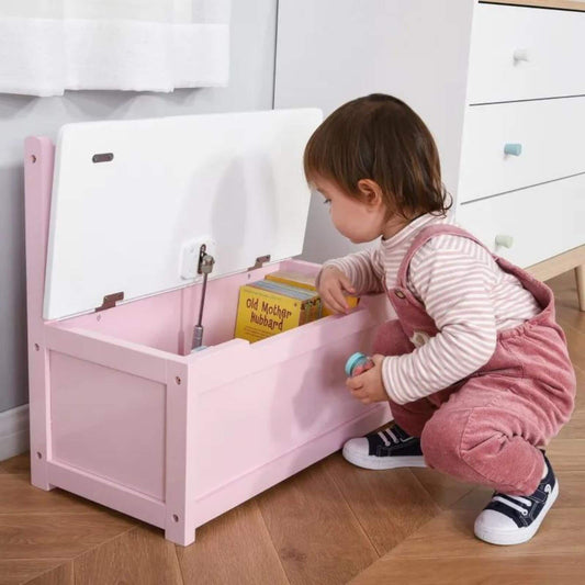 Kid Getting books from Qaba 2-in-1 Kids Wooden Toy Organizer Chest with Seat Bench Pink