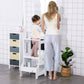 Kid Standing on Qaba 2-in-1 Kitchen Table Set Toddler Standing Tower with Chalkboard White