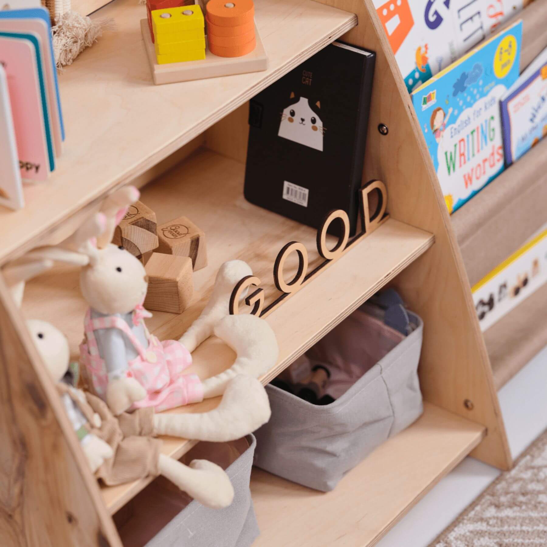 Goodevas 2in1 Montessori Shelf with toys, books, and educational materials in a child's room.
