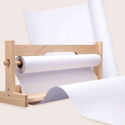 Wooden paper roller with a roll of white paper on a light beige background