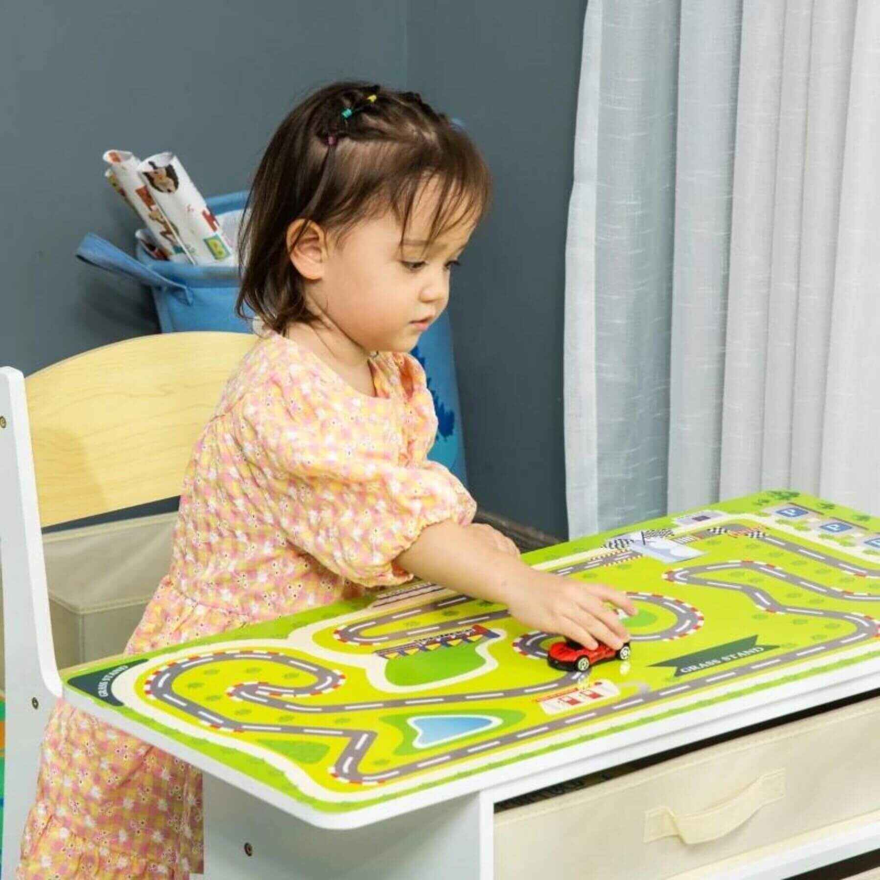 Girl Using Qaba 3-in-1 Kids Activity Table and Chairs Set with 3 Surfaces Natural Wood