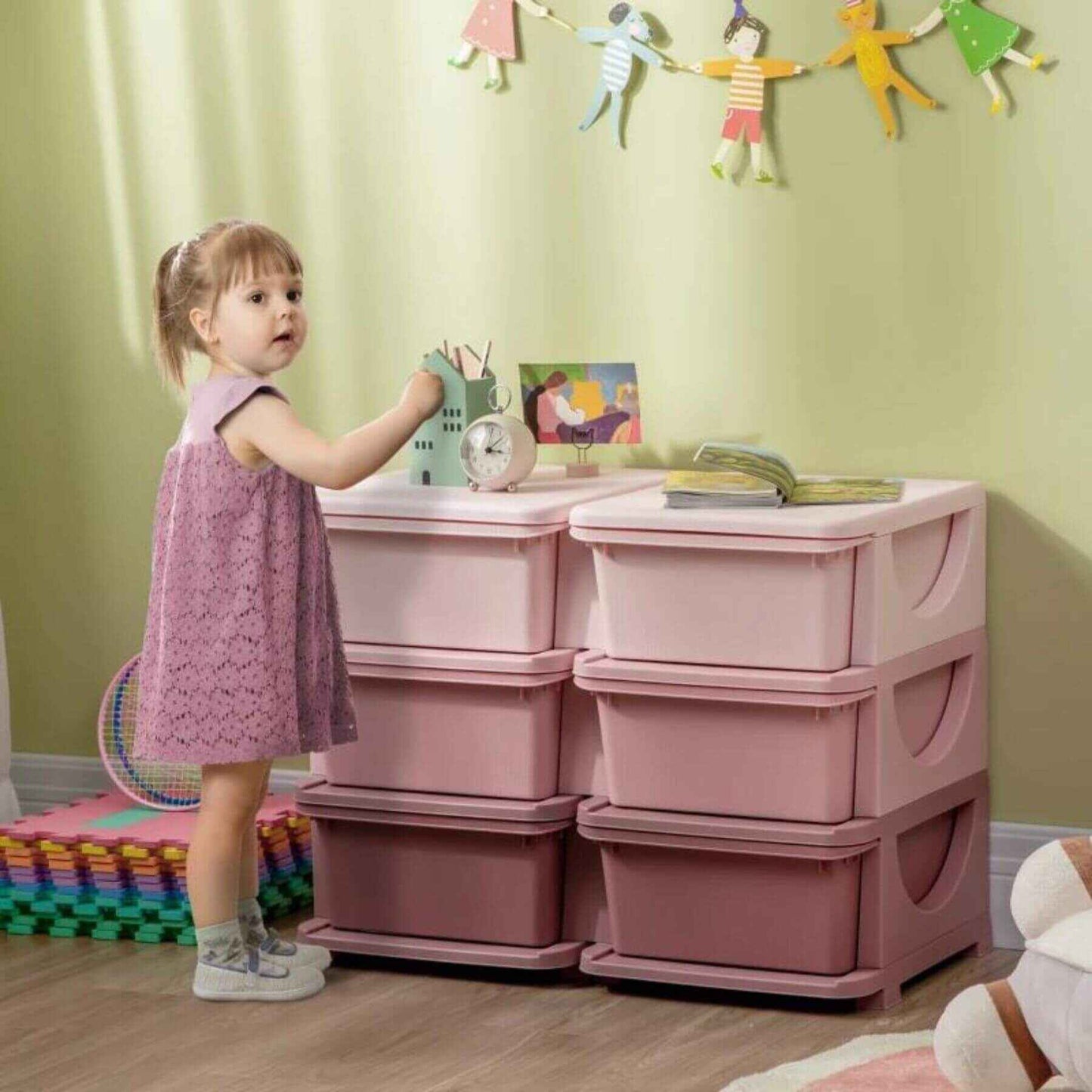 Girl Standing next to Qaba 3 Tier Kids Storage Unit, 6 Drawer Chest, Plastic Bins for Kids Bedroom, Pink