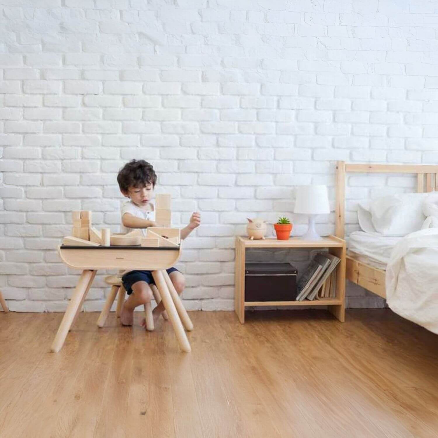 Boy Playing PlanToys 50 Unit Blocks