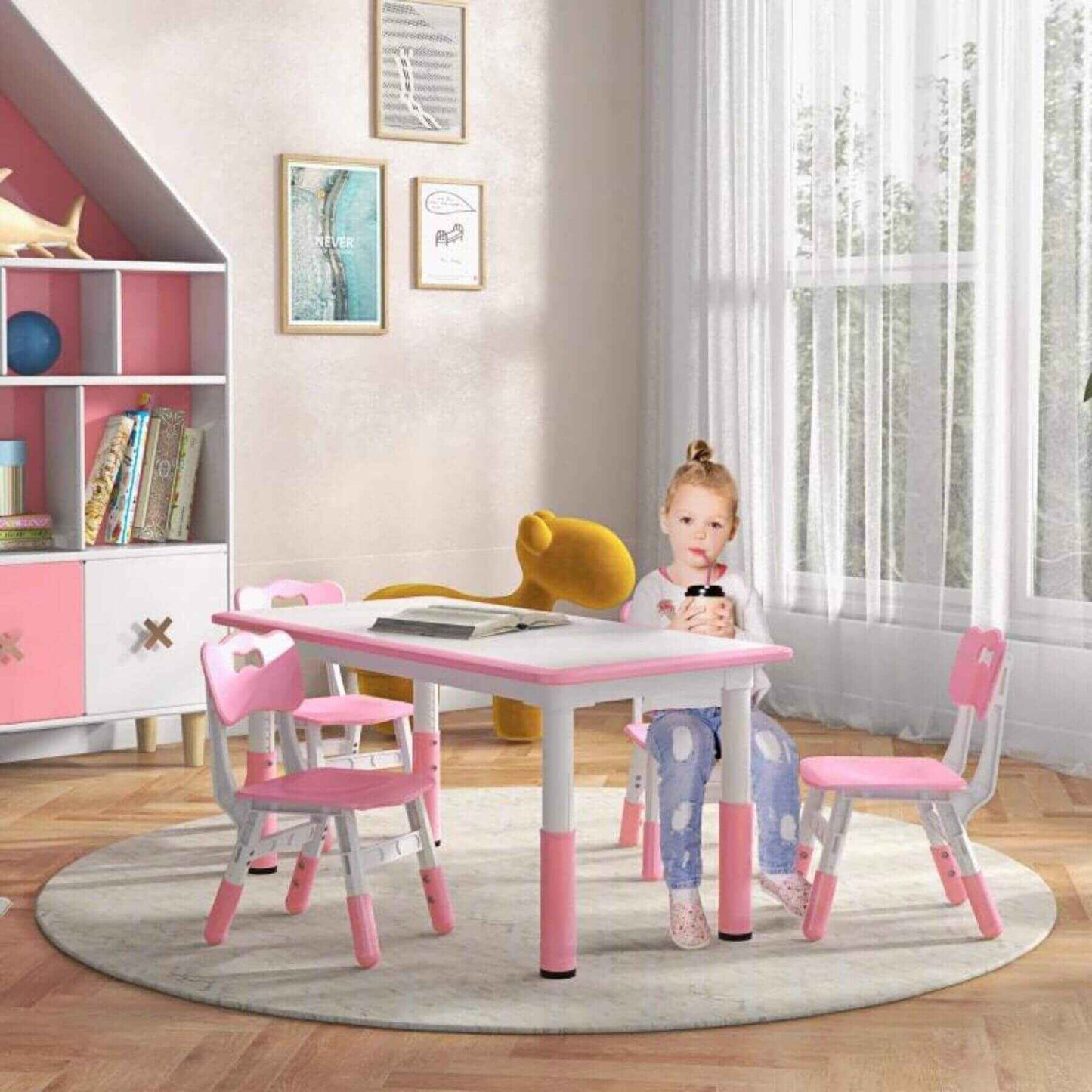 Girl Sitting at Qaba 5 Piece Toddler Table and Chair Set, Adjustable Height Chairs, Pink