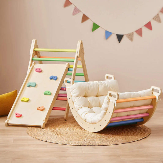 Tiny Land® 7-in-1 Rainbow Climbing Set with Play Pad on a wooden floor.