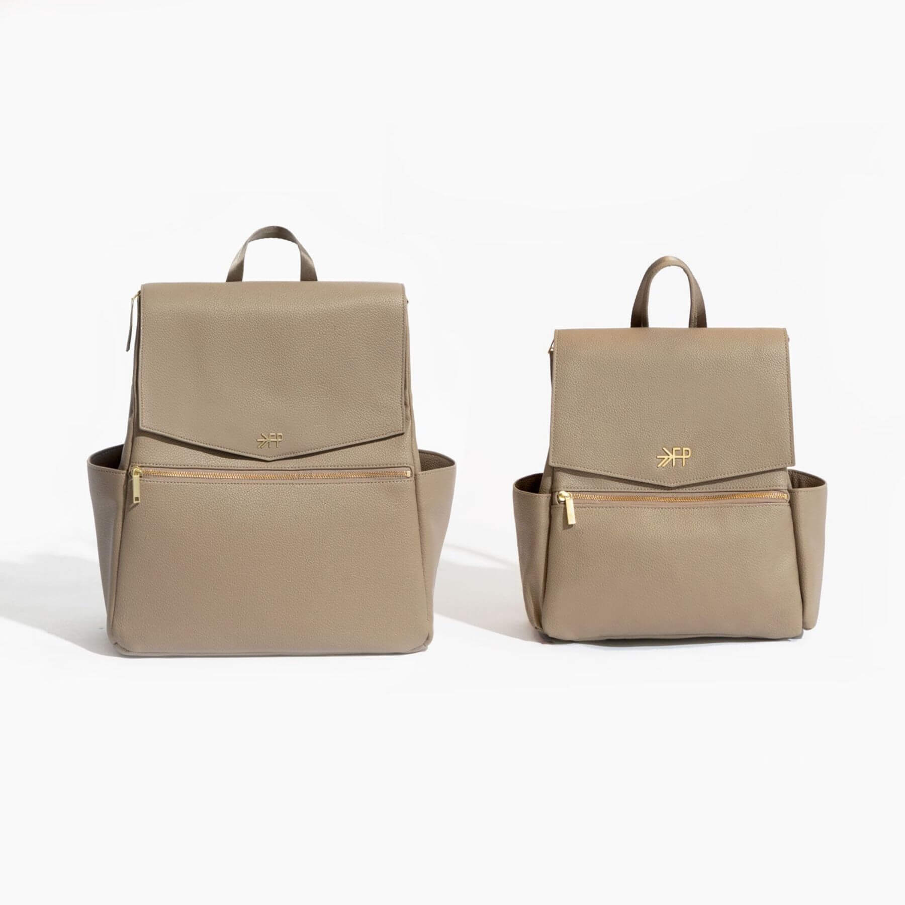 Two Aspen backpacks with a logo