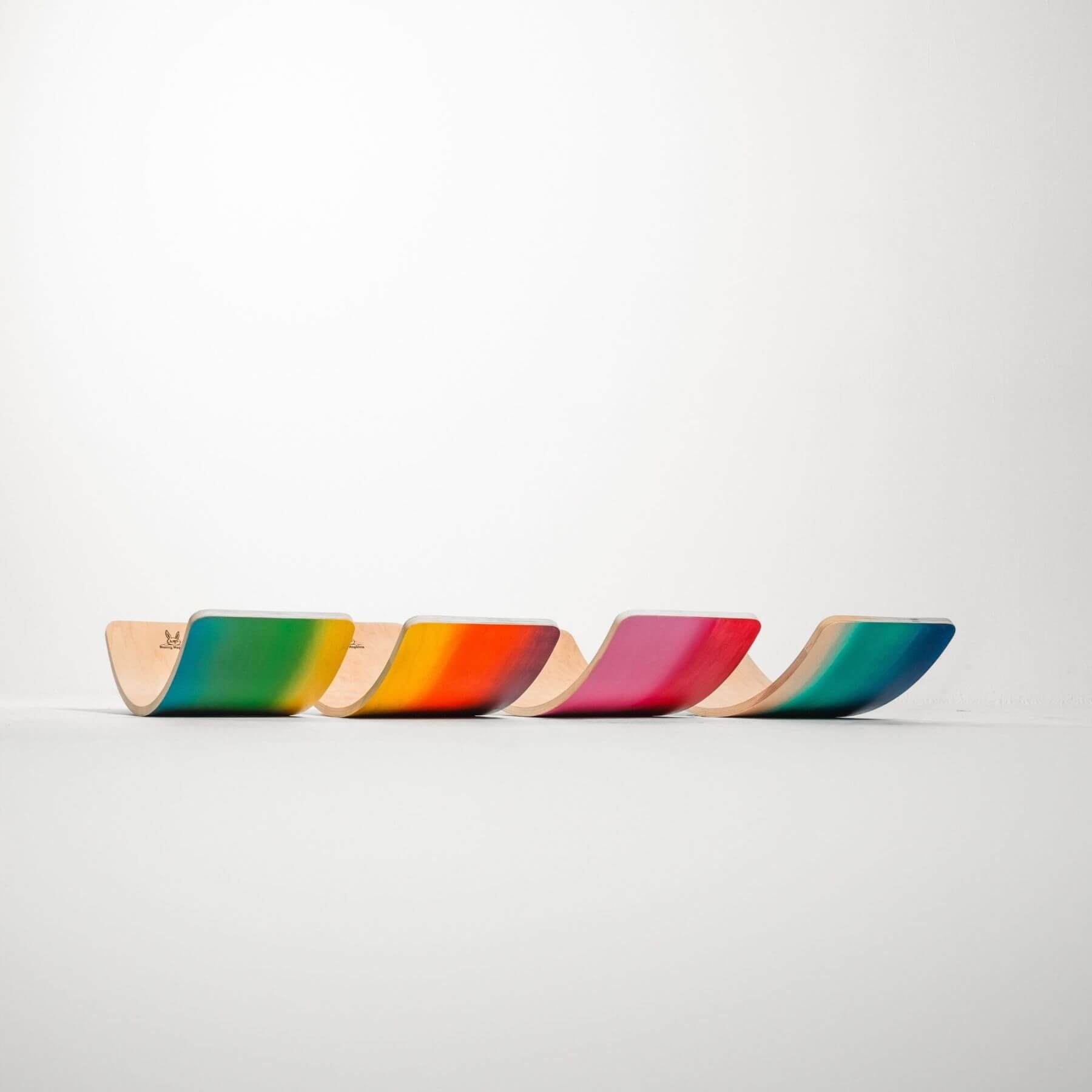 Set of colorful balance boards on a white background