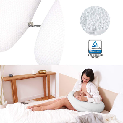 Woman using B.Love U-Shape Pregnancy Pillow - Mineral in a bedroom setting with TUV Rheinland certification logo.