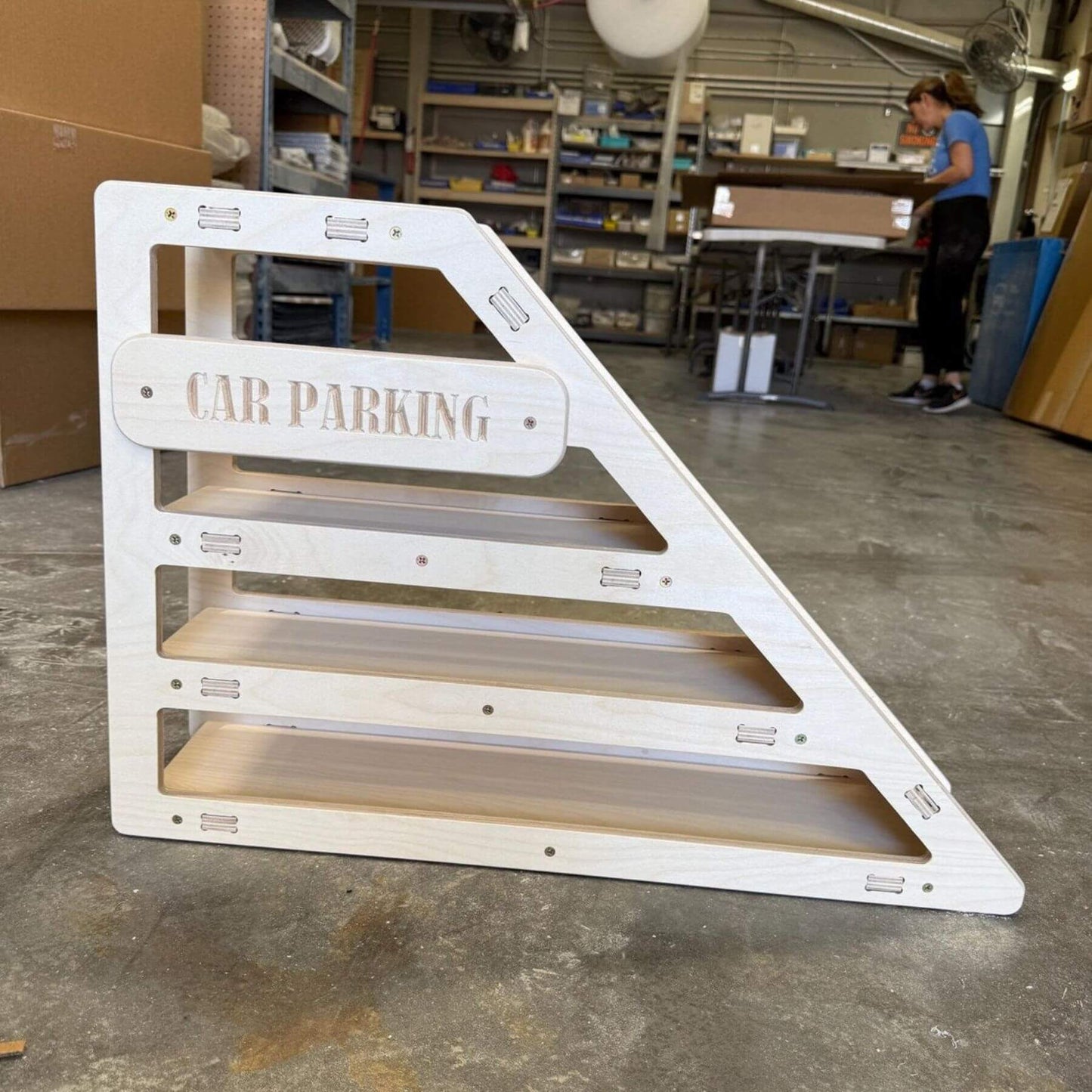 CAMDEN- Toy Car Storage + Ramp in a warehouse setting