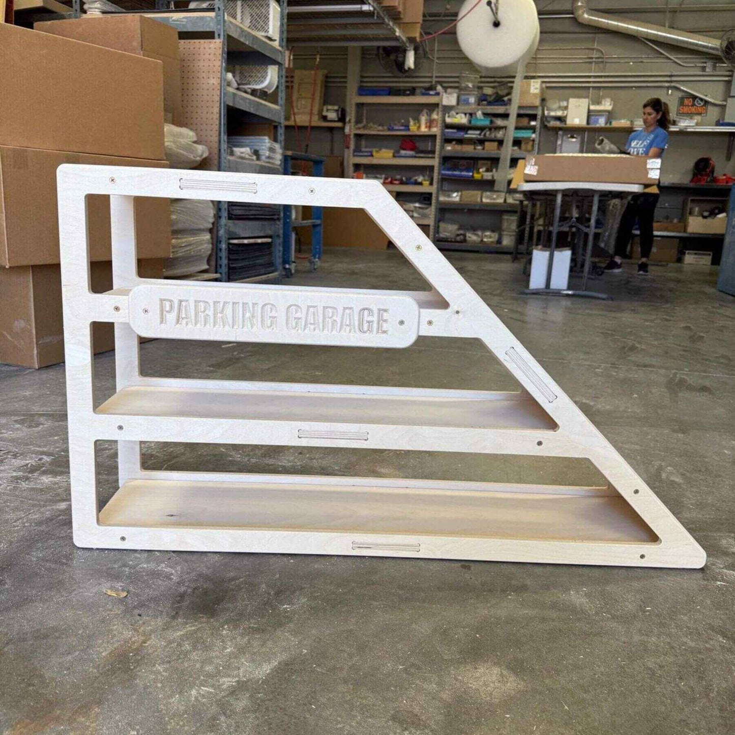 CAMDEN- Toy Car Storage + Ramp in a warehouse setting