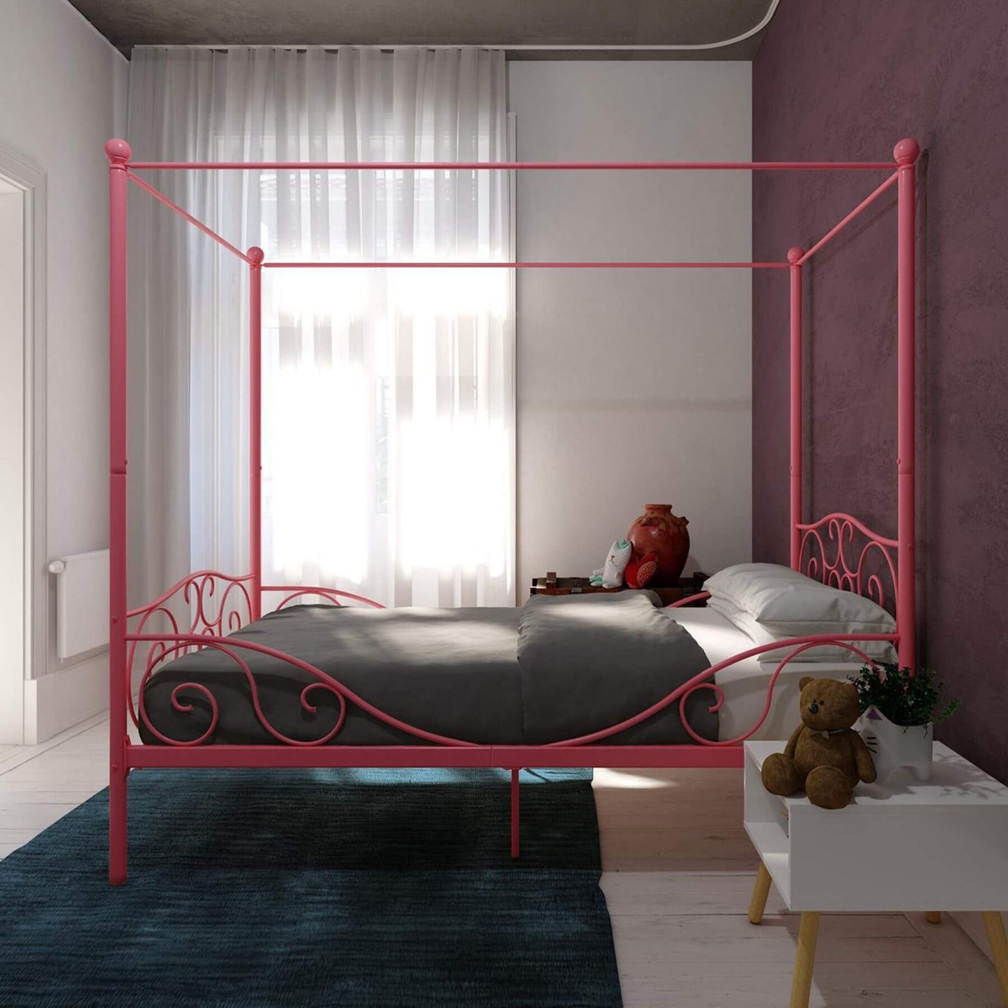 DHP Canopy Metal Bed Twin - Pink in a bedroom with a teddy bear and plant on a nightstand.