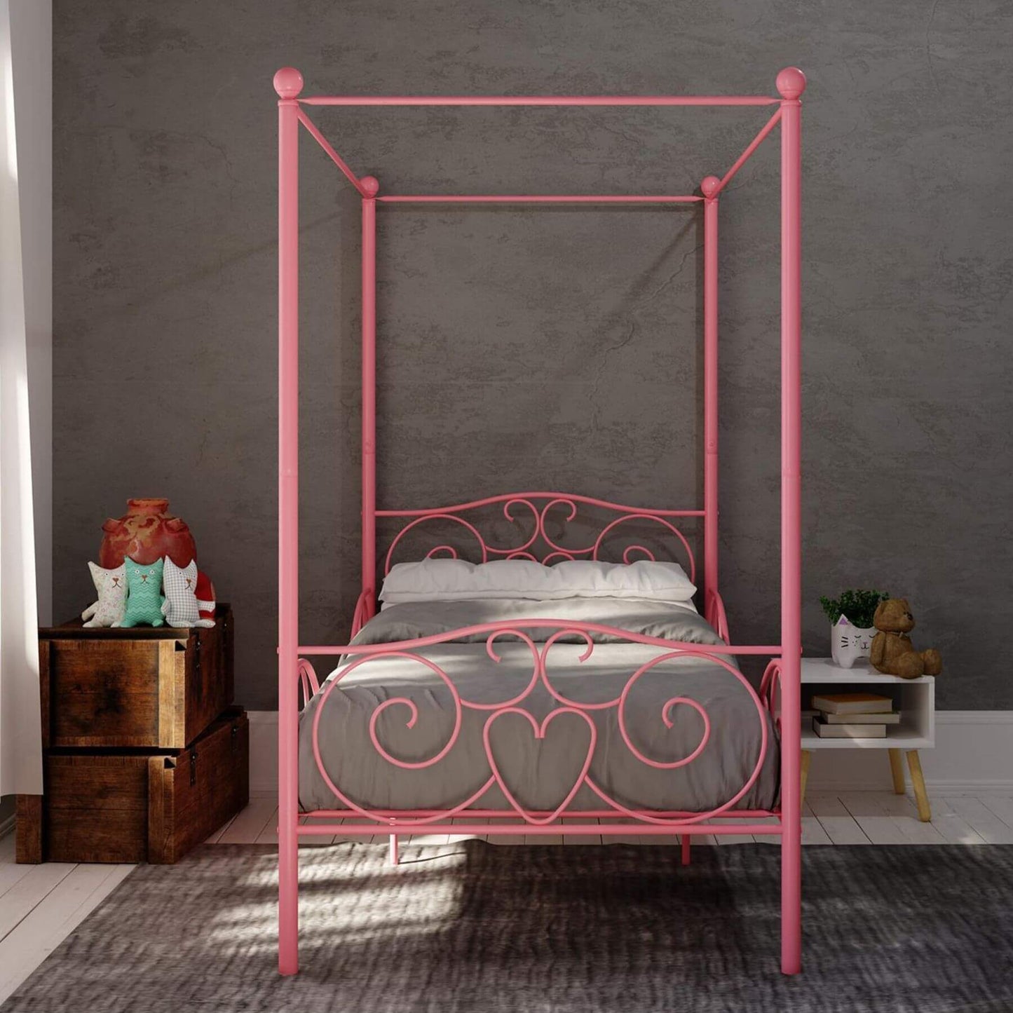 DHP Canopy Metal Bed Twin - Pink in a room with gray walls and wooden furniture.