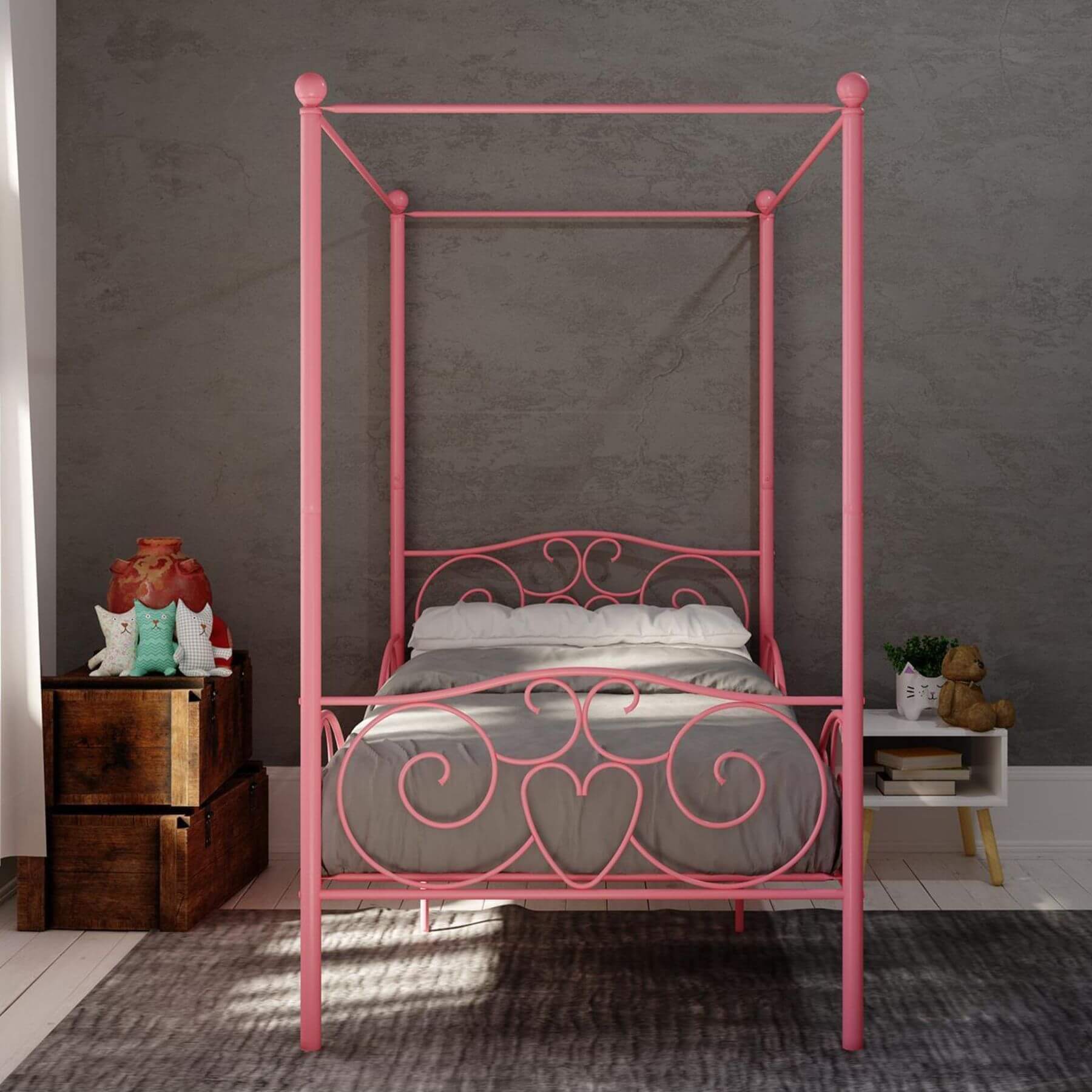 DHP Canopy Metal Bed Twin - Pink in a room with gray walls and wooden furniture.