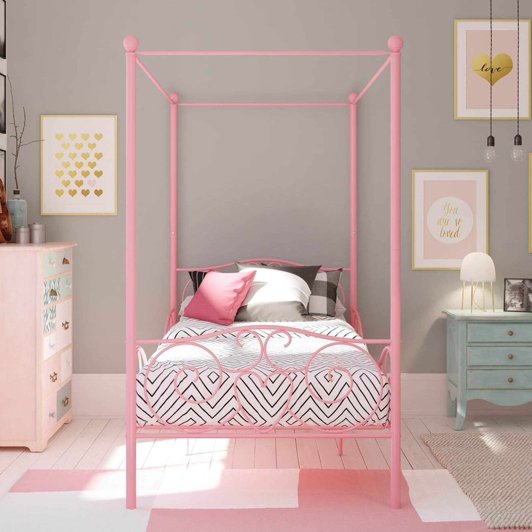 DHP Canopy Metal Bed Twin - Pink in a room with gray walls and decorative elements.