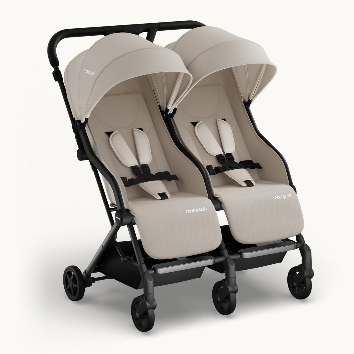 A double stroller with two beige seats, matching canopies, and a black frame, shown on a clean off-white background.