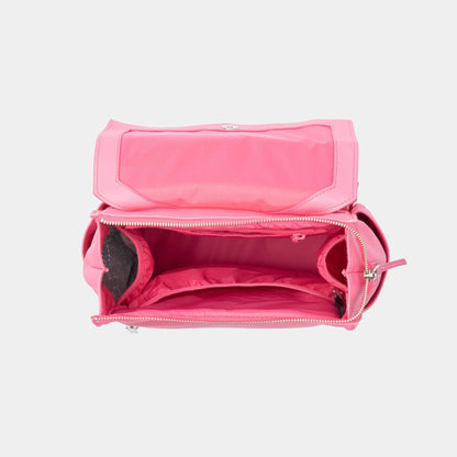 Freshly Picked Hot Pink Mini Classic Diaper Bag II with open lid on a light gray background