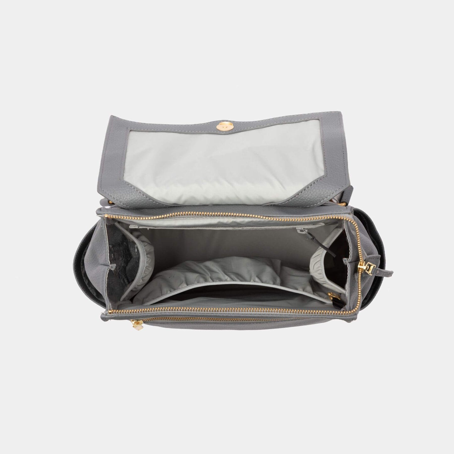 Freshly Picked Stone Mini Classic Diaper Bag II with open compartment on a white background