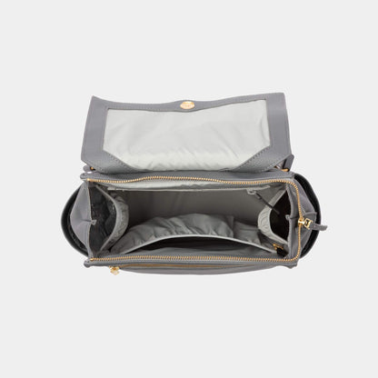 Freshly Picked Stone Mini Classic Diaper Bag II with open compartment on a white background