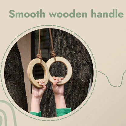 Two wooden rings hanging from a tree with text 'Smooth wooden handle' on a beige background.