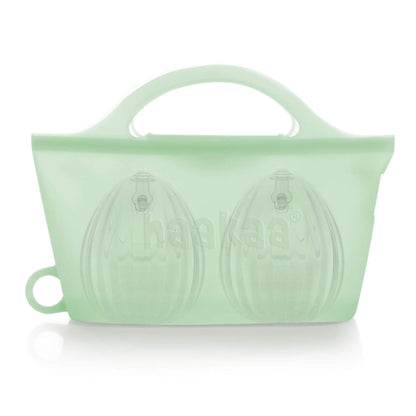 Light green silicone bag with handles on a white background
