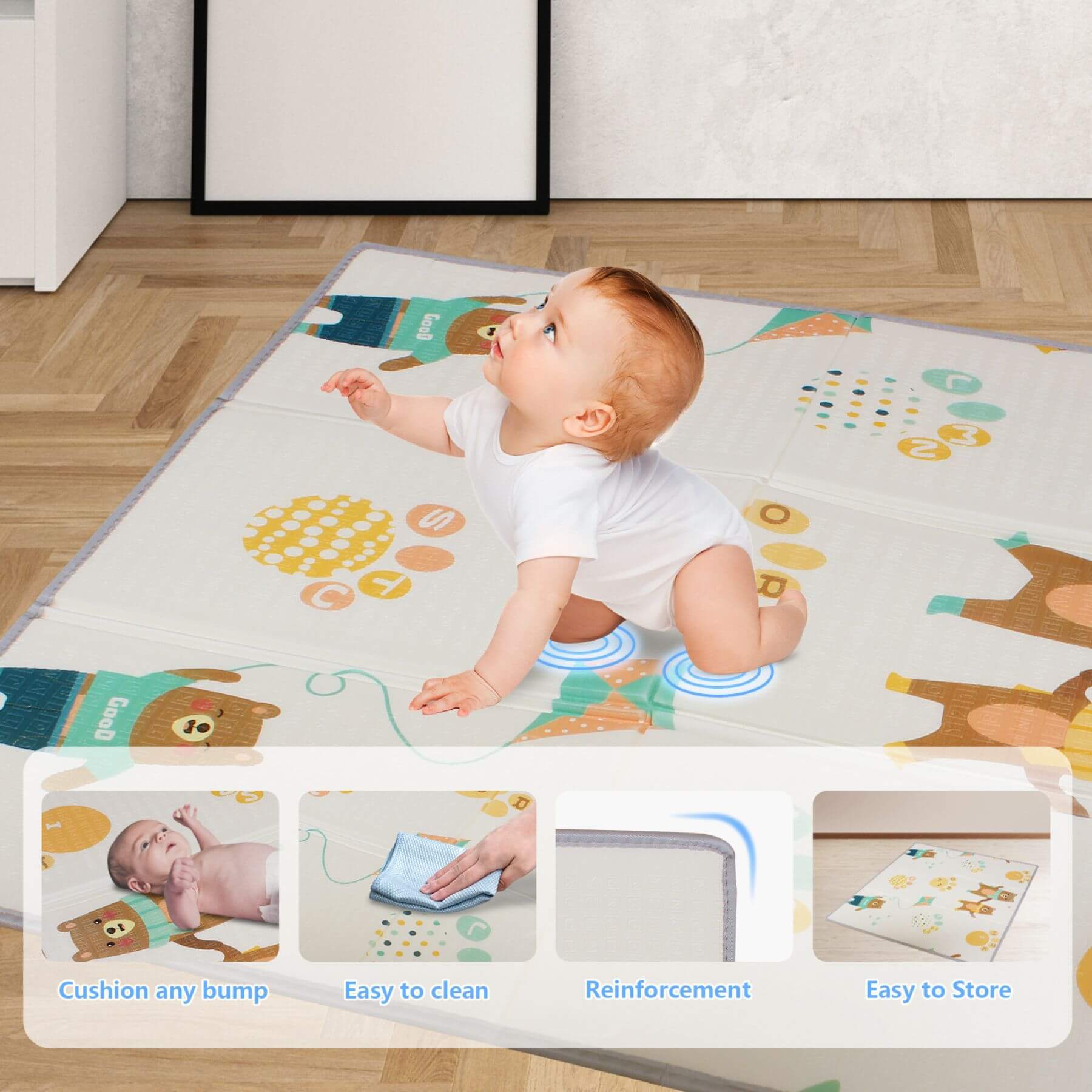 Baby playing on a colorful play mat with educational designs on a wooden floor.