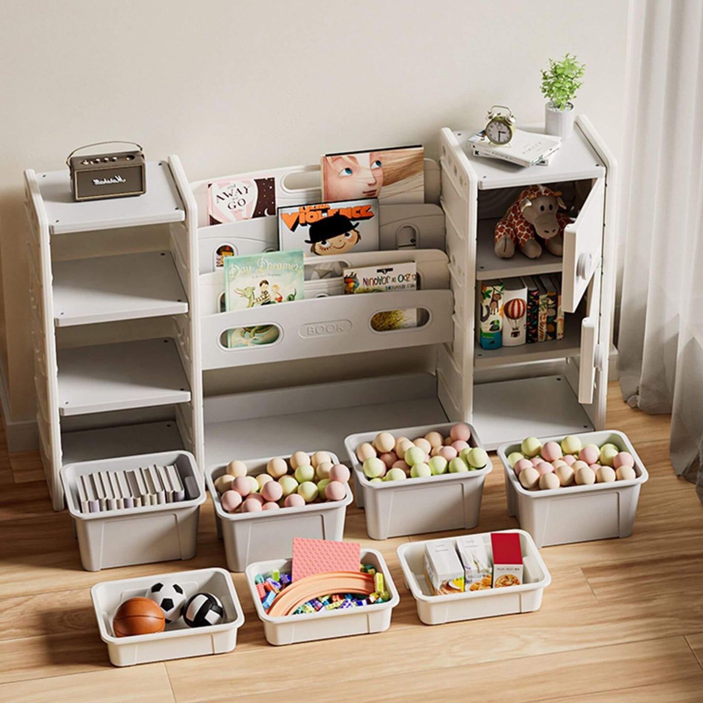 MONTARY Kids Toy Storage Organizer w/ 8 Removable Toy Bins - Ivory, toys, and books on a wooden floor.