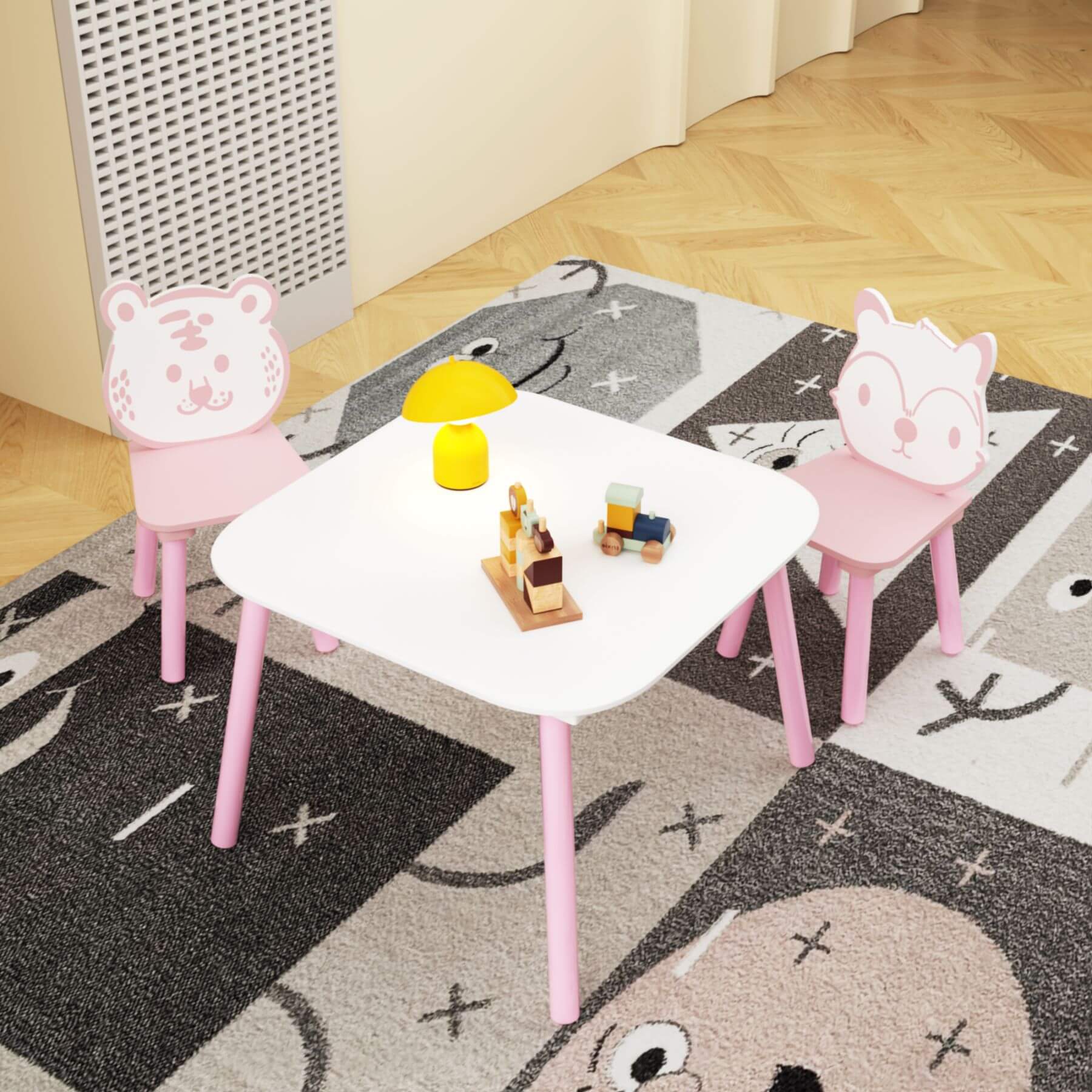 MOONRIVER 3-Piece Wooden Toddler Desk with Animal Backrest - Pink & White with toys on a patterned rug