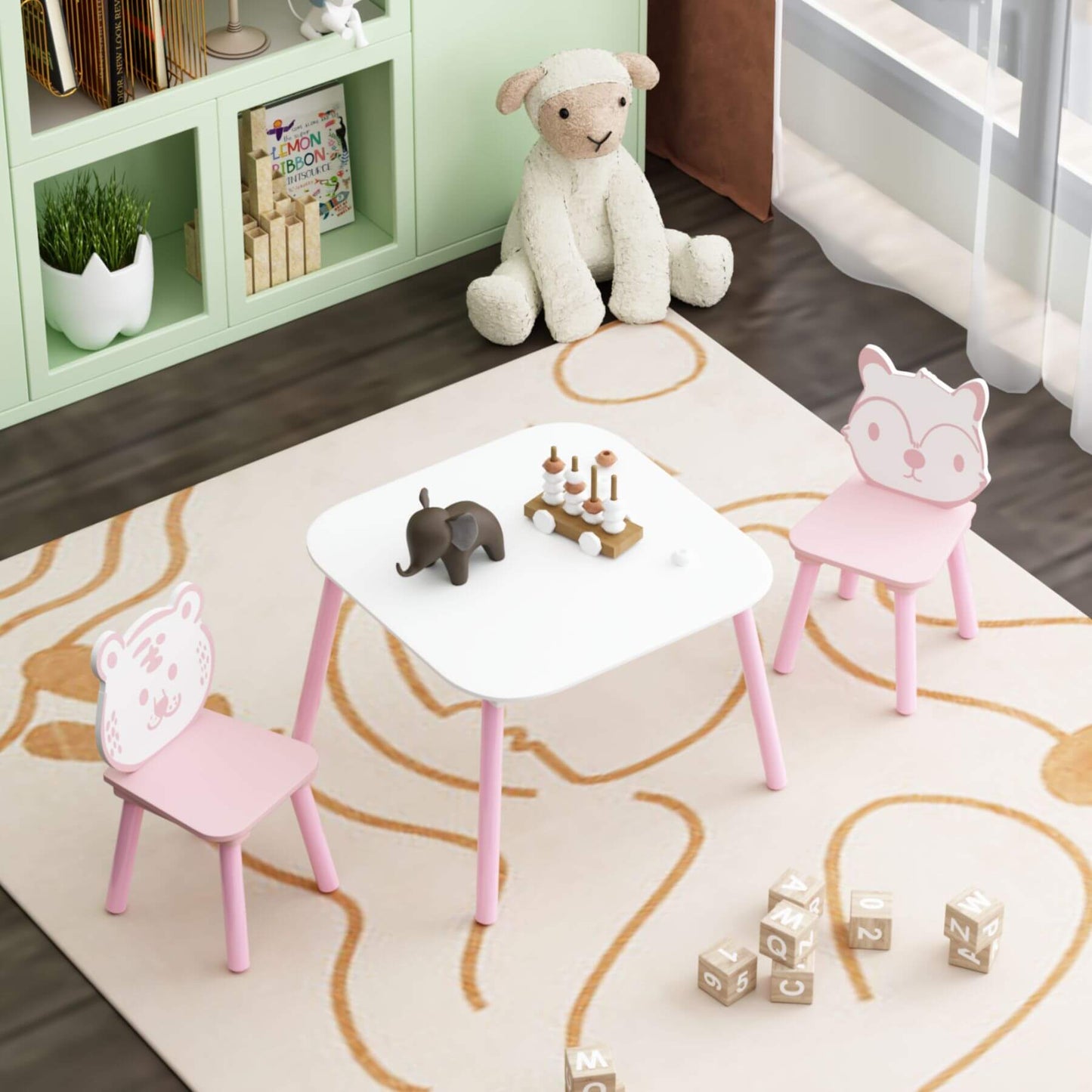 Children's play area with MOONRIVER 3-Piece Wooden Toddler Desk with Animal Backrest - Pink & White, toys, and a teddy bear on a rug.