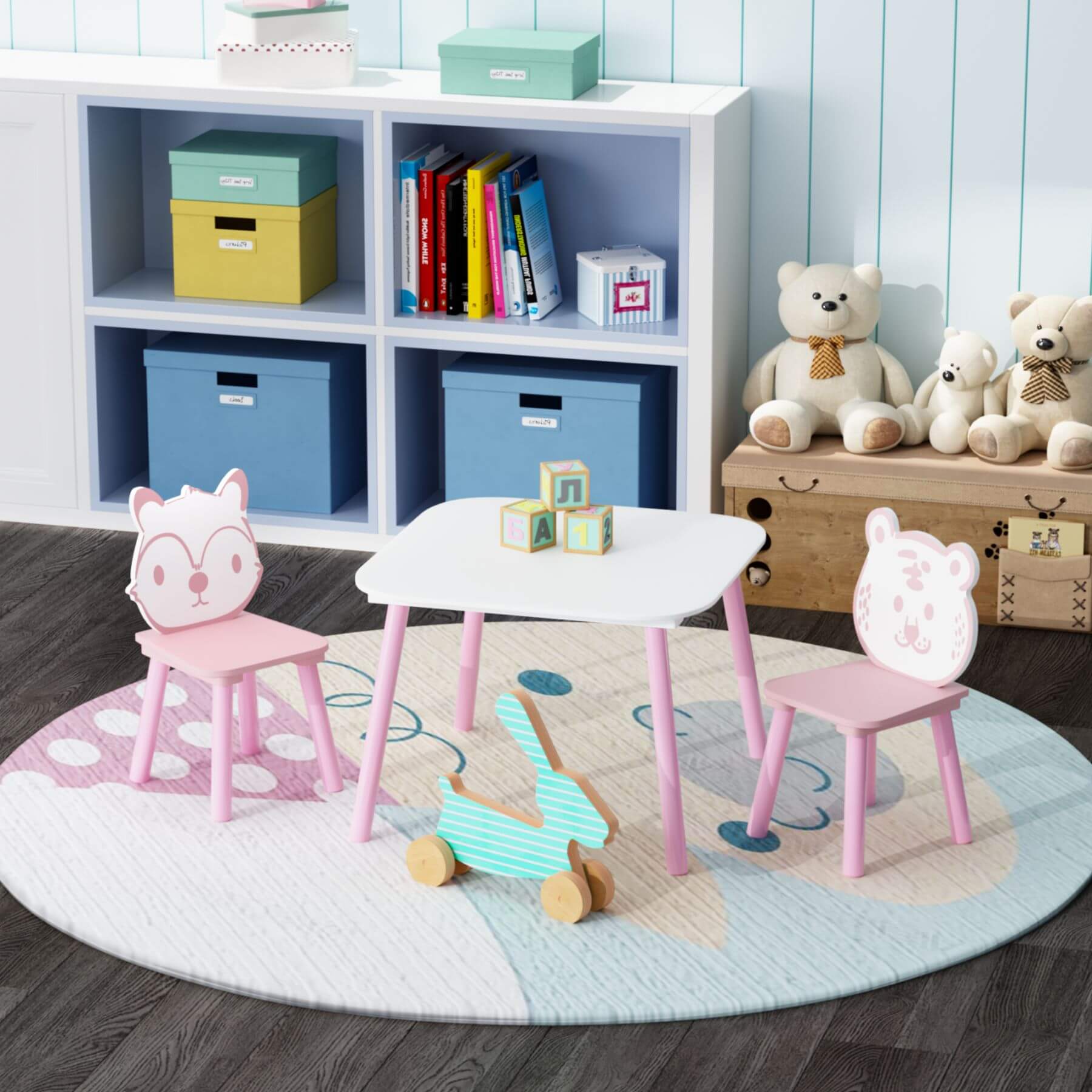 Children's playroom with MOONRIVER 3-Piece Wooden Toddler Desk with Animal Backrest - Pink & White, toys, and storage boxes.