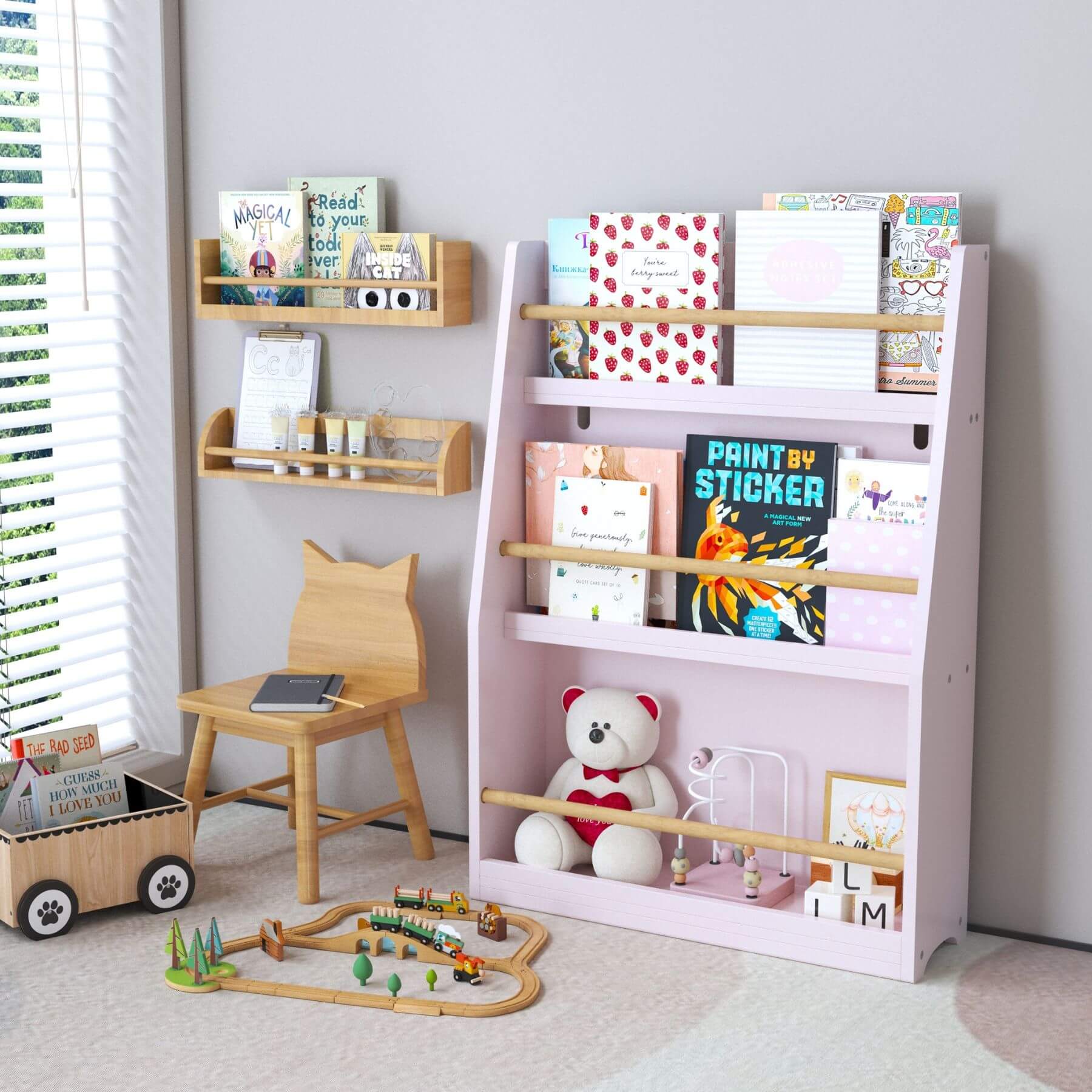 Children's room with MOONRIVER 3 Tier Kids Book Shelf - Pink, wooden chair, and toys.
