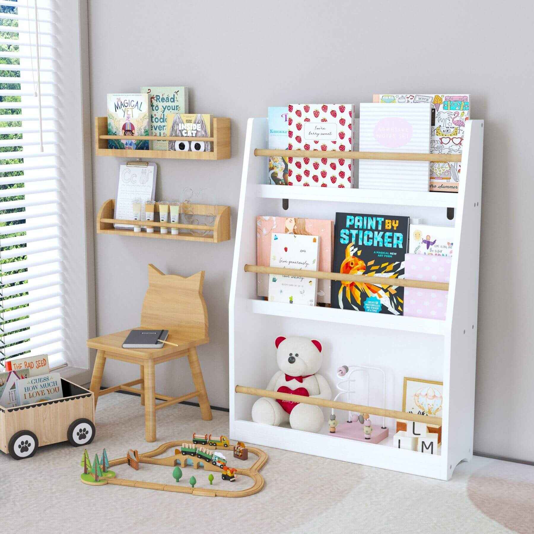 Children's room with MOONRIVER 3 Tier Kids Book Shelf - White, wooden chair, and toys.