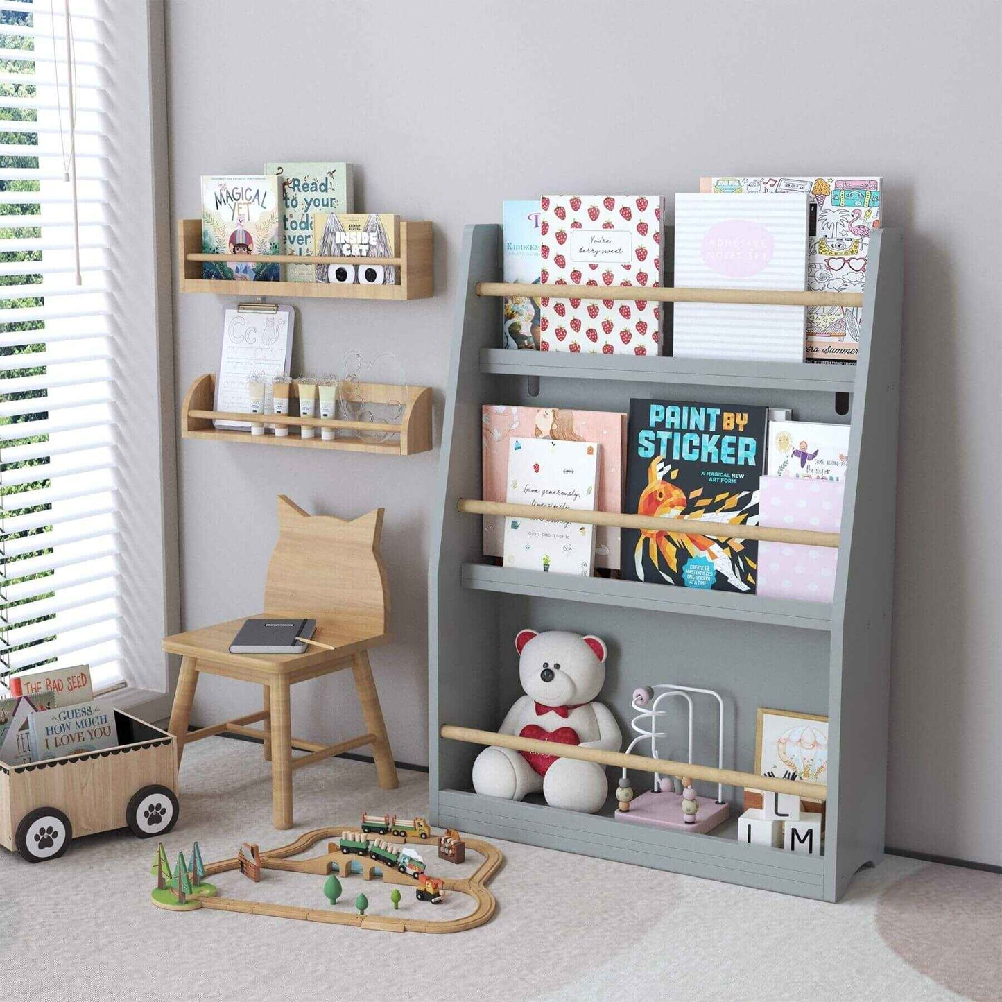 Children's room with MOONRIVER 3 Tier Kids Book Shelf - Gray, wooden chair, and toys on a light gray floor.