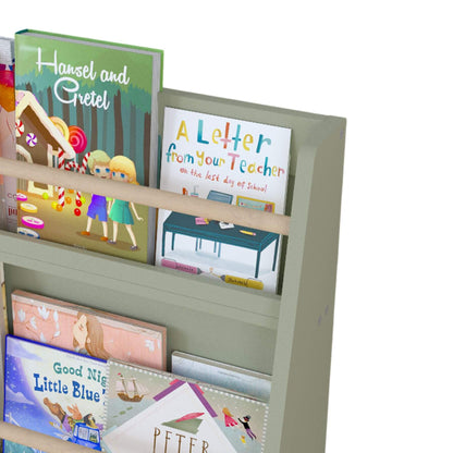 Children's books on a bookshelf with visible titles and colorful covers.