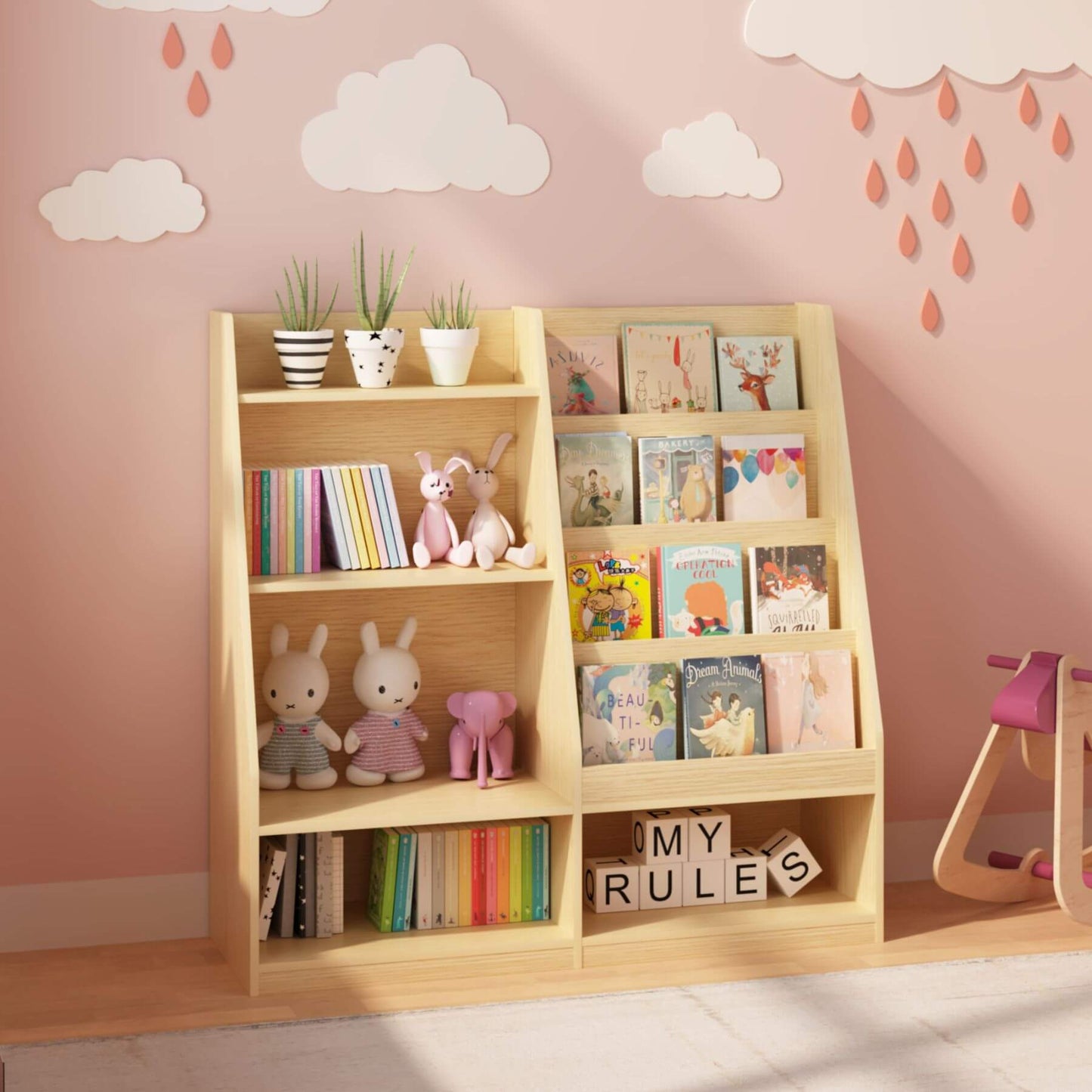 MOONRIVER Kids Multifunctional 4 Tier Wooden Kids Book Shelf - Natural with children's books and toys against a pink wall with cloud and raindrop decorations.