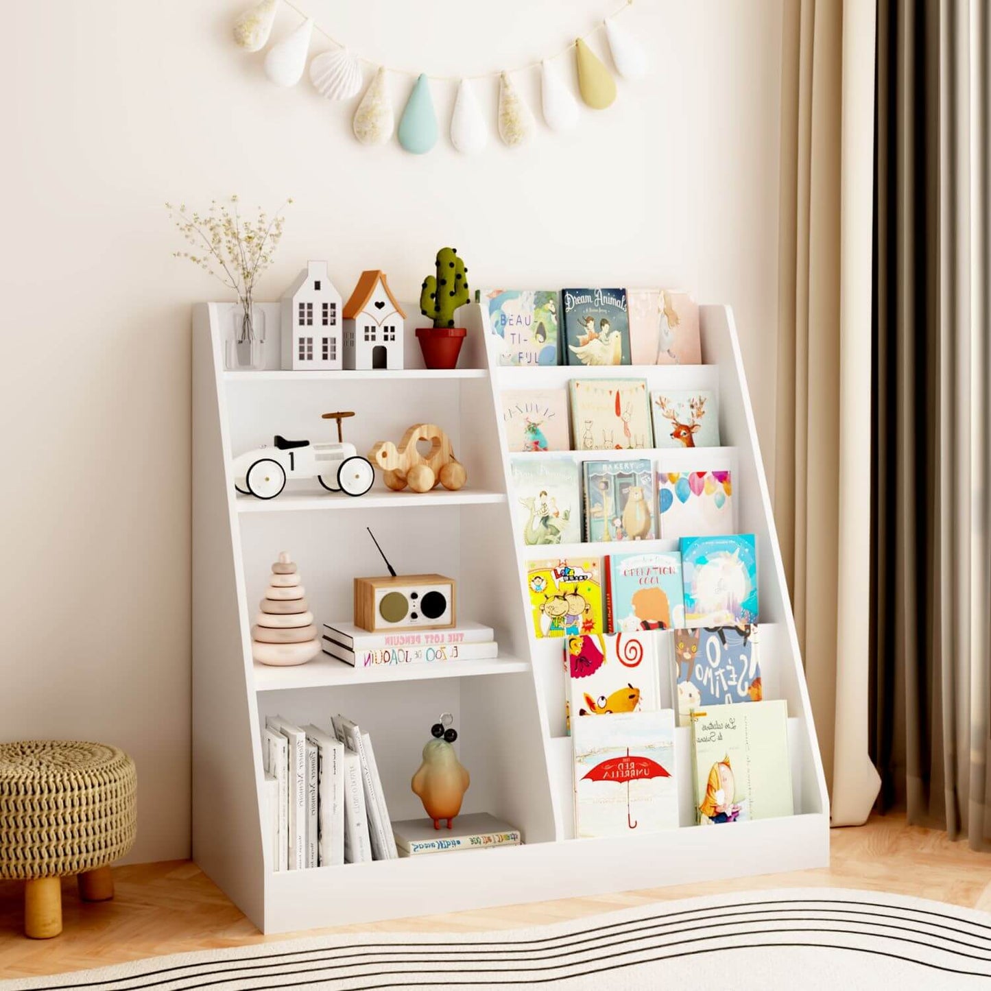 White children's bookshelf with books and toys in a room setting