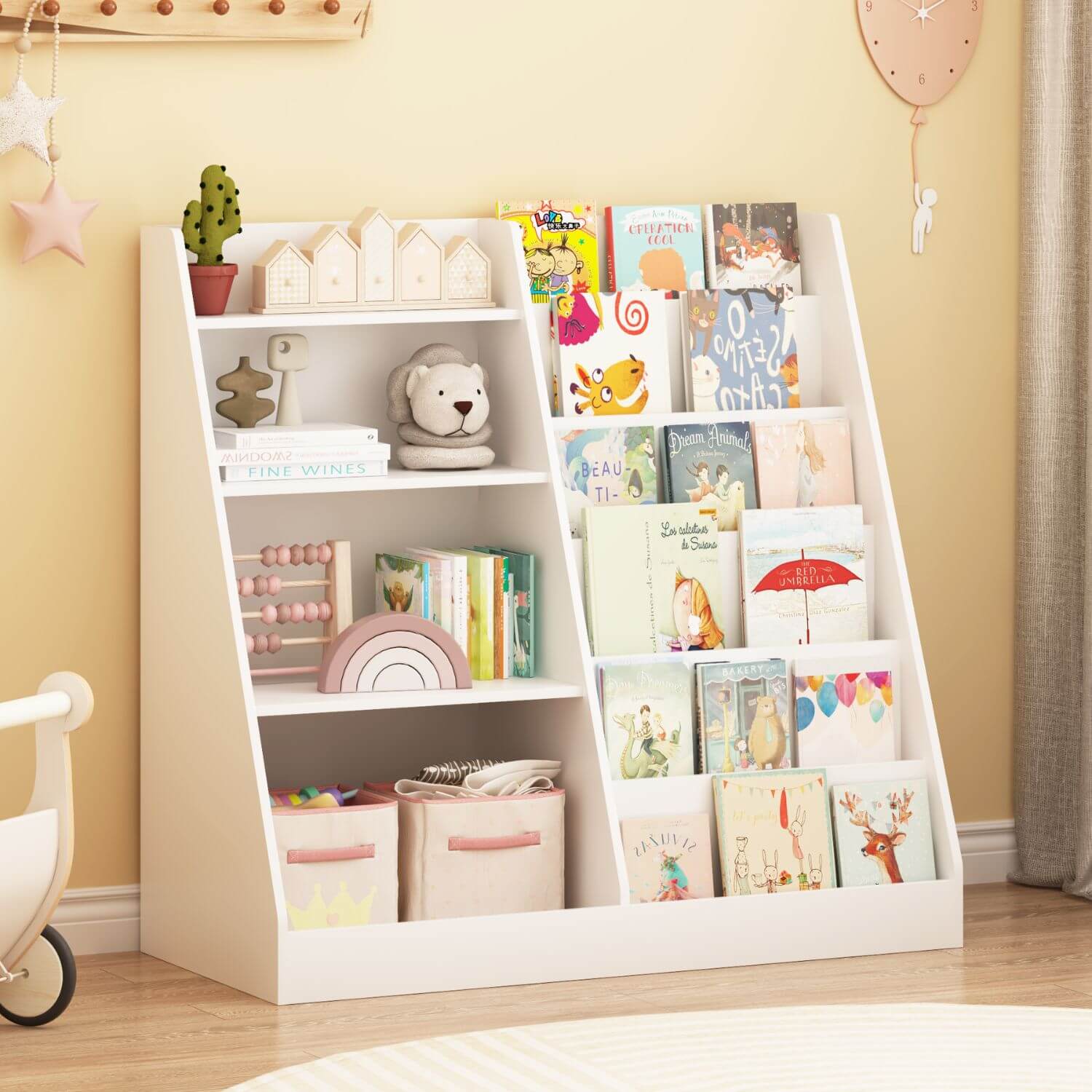 White children's bookshelf with books and toys against a yellow wall.