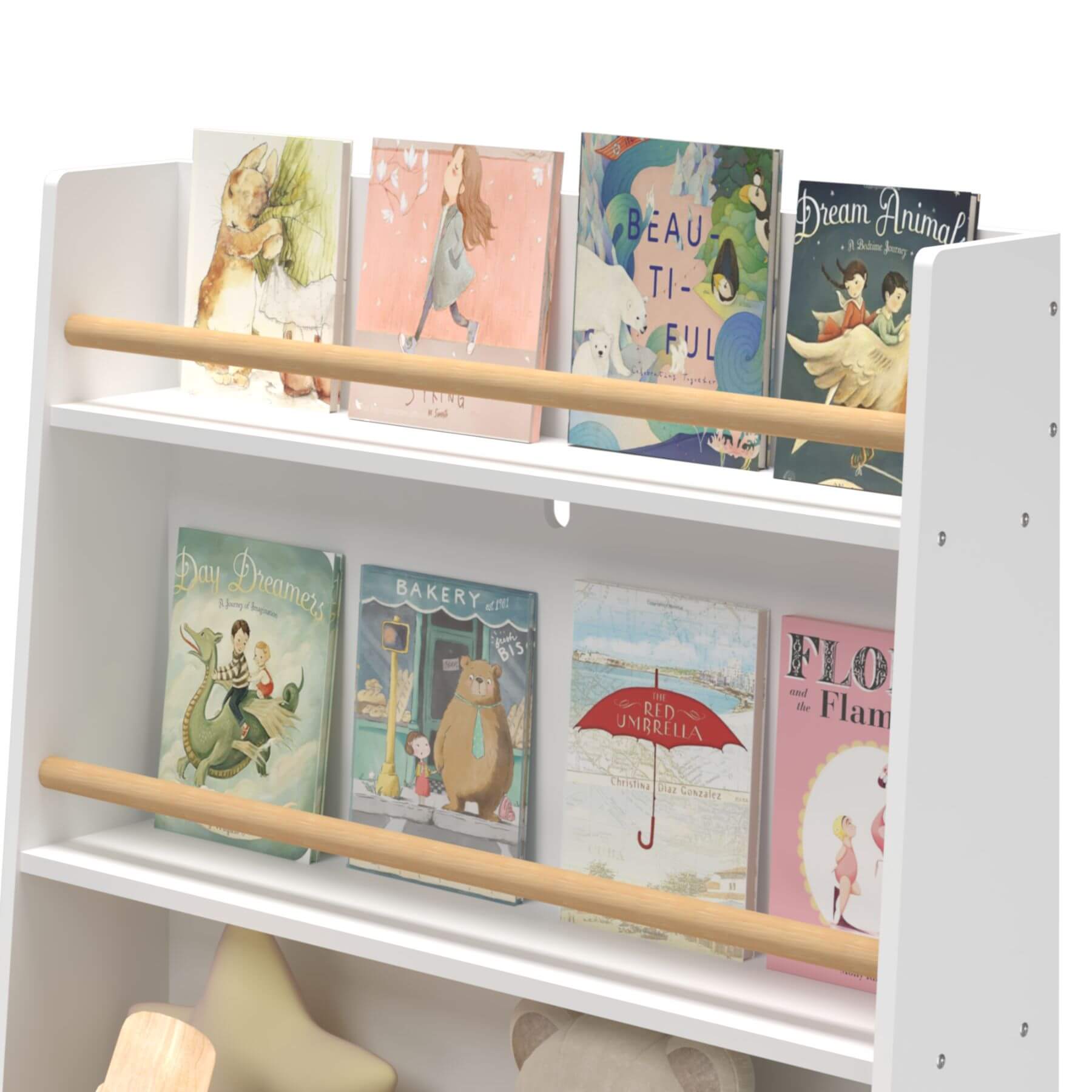Children's books on a white bookshelf with wooden shelves
