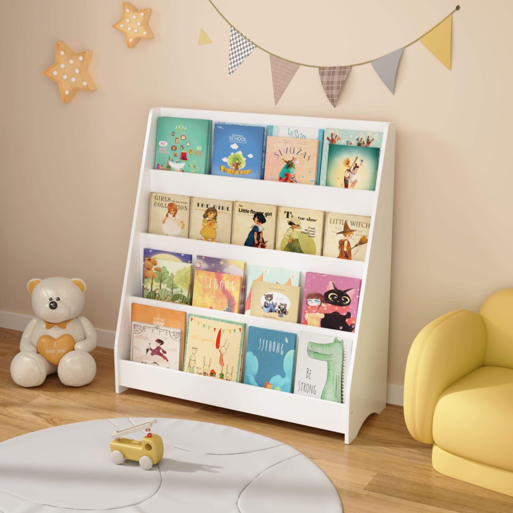 MOONRIVER Toddler Book Display Shelves - White with books in a room decorated with a teddy bear, toy car, and colorful flags.