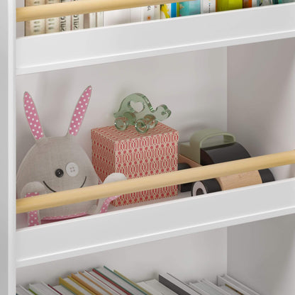 White bookshelf with toys and books