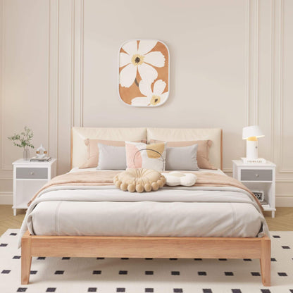 Bedroom with wooden bed, white bedding, and decorative pillows.