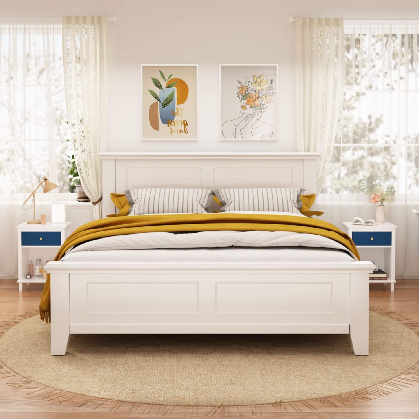 White bedroom with a bed, nightstands, and wall art