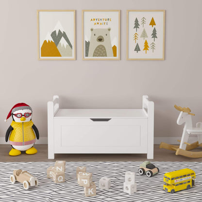 Children's room with MOONRIVER Kids Toy Box Chest - White, penguin figurine, and various toys on a patterned rug.