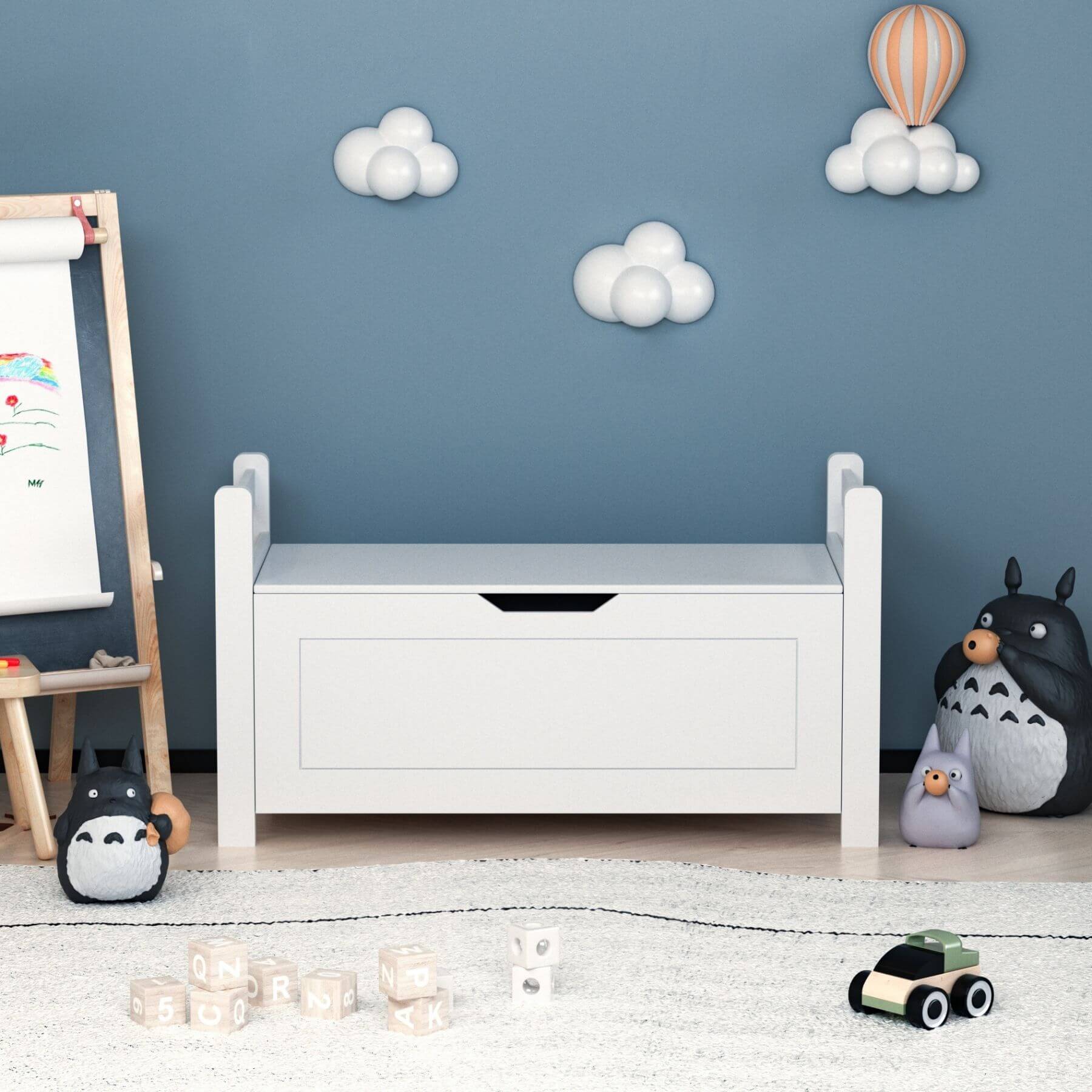 Children's room with MOONRIVER Kids Toy Box Chest - White, toys, and wall decorations.