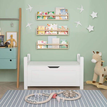 Children's room with MOONRIVER Kids Toy Box Chest - White, shelves with books, and toys on a green wall.