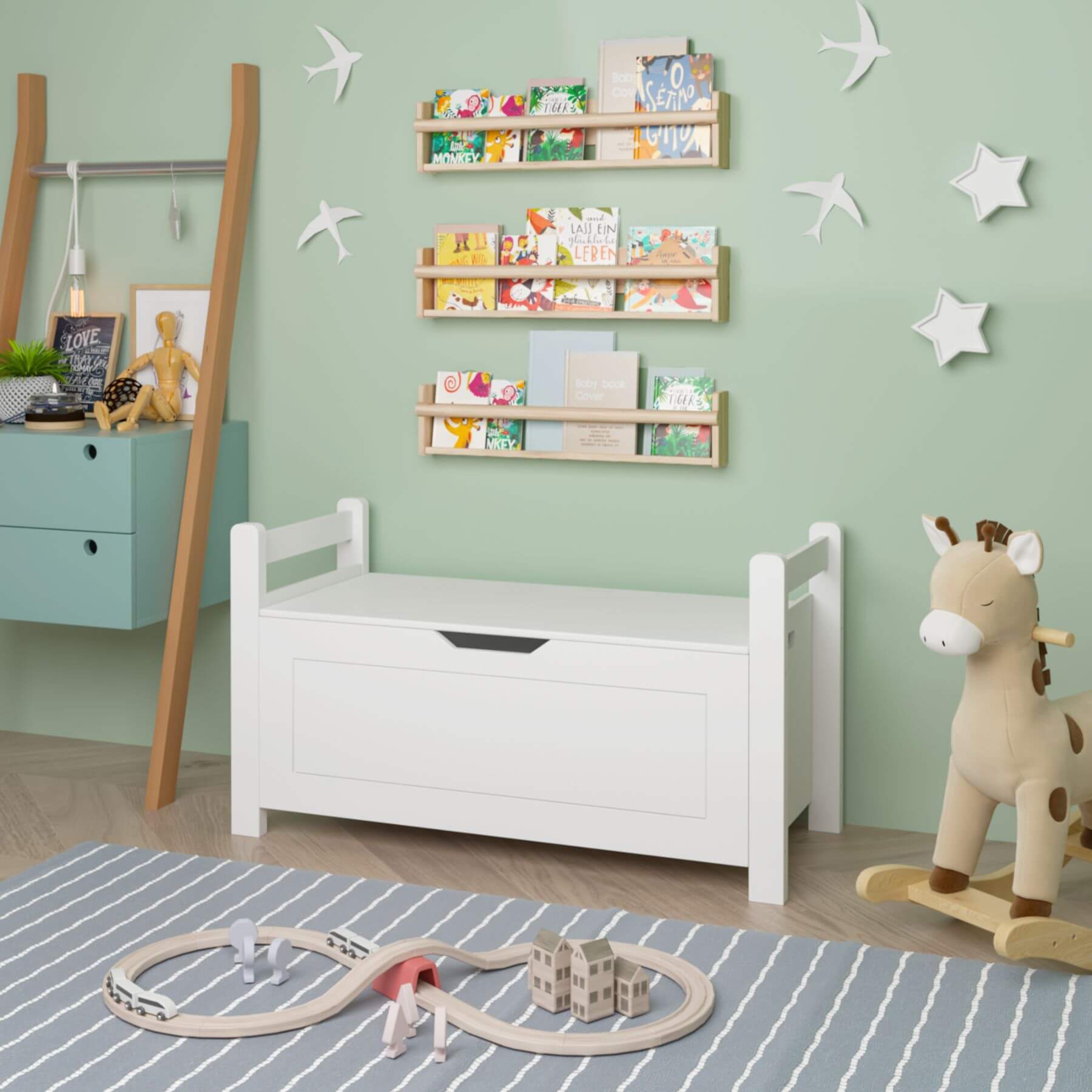 Children's room with MOONRIVER Kids Toy Box Chest - Whited, toys, and shelves on a light green wall.